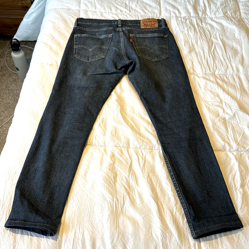 Men’s Levi’s 511 dark wash, size 32/30. Perfect condition.